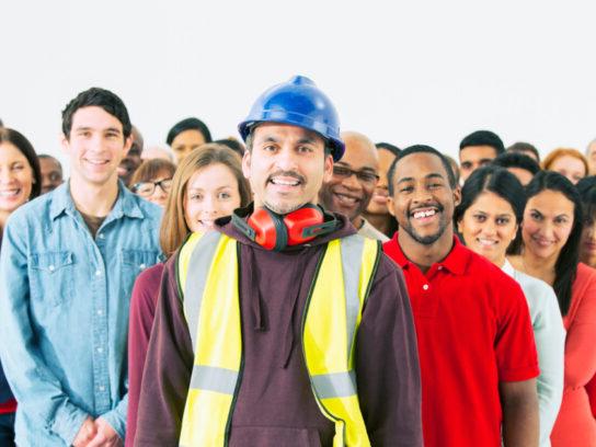 photo of construction worker and other workers